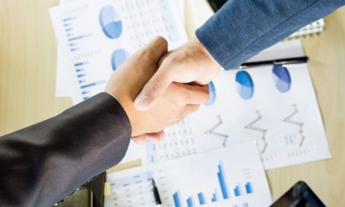 businessmen-shaking-hands-during-meeting_1423-80